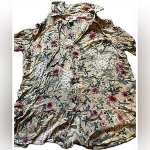 Tan floral womens shirt.
